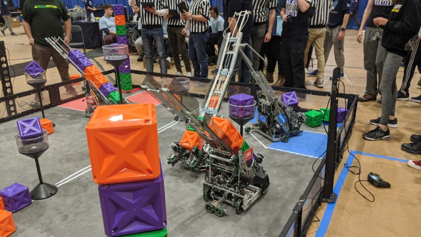 A vex field with robots on it